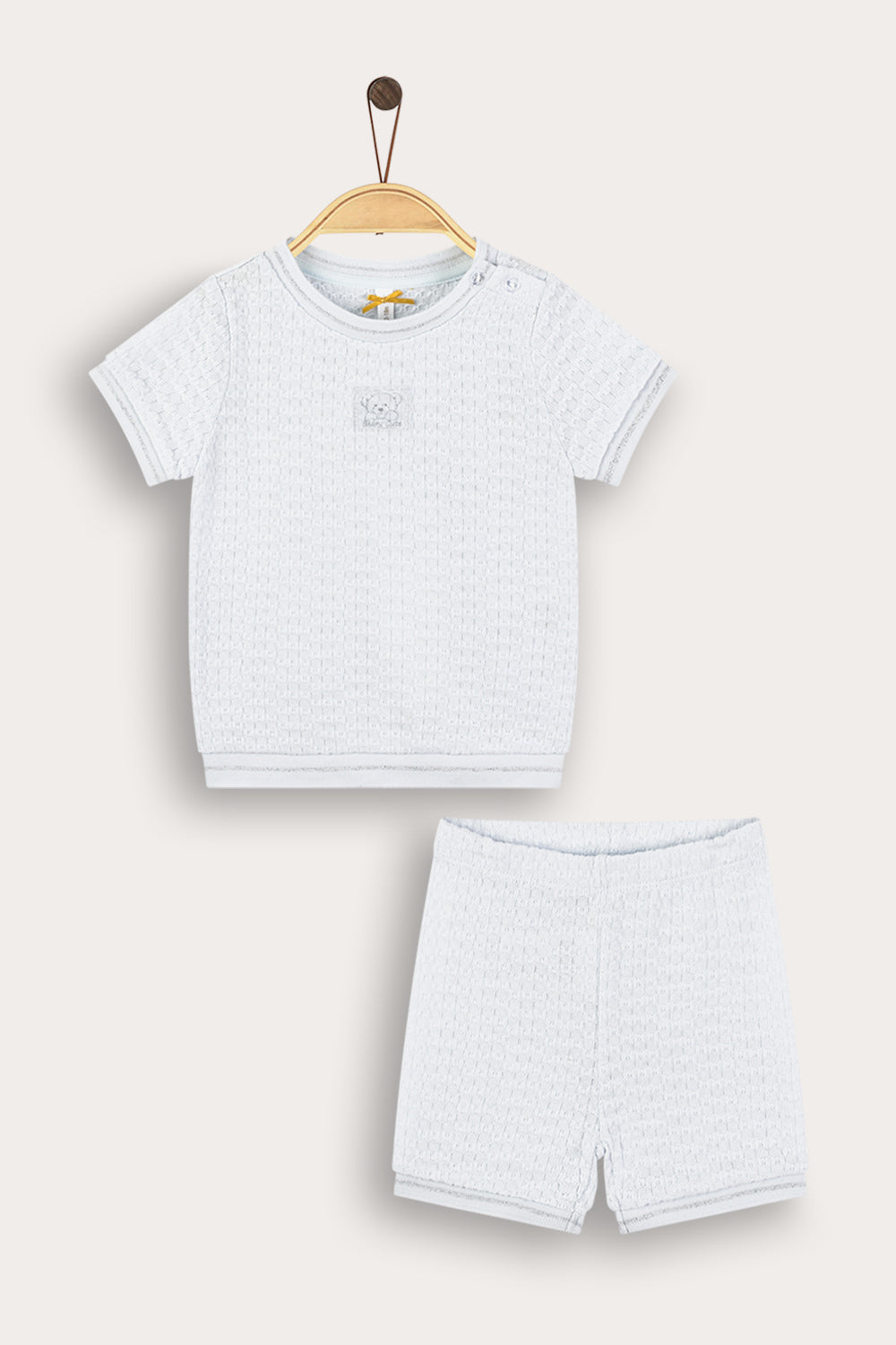 Conjunto de bebé con logo frontal